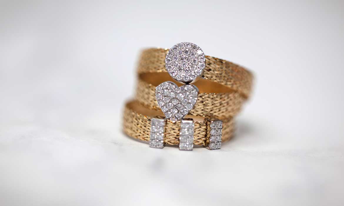Gold colored studded rings